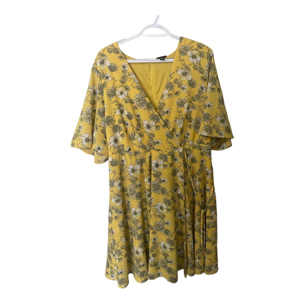 Torrid size 14 asymmetrical dress. Low cut. Very flowy & flattering.